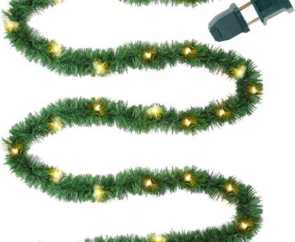 Pre-lit artificial Christmas garland stored properly in loose loops